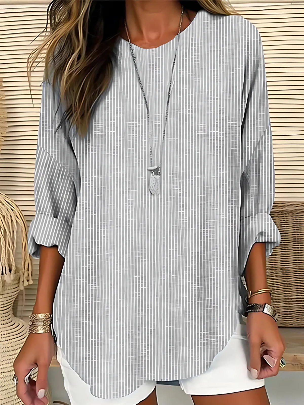 Airy vertical-stripe blouse in a relaxed, floaty cut suitable for everyday wear
