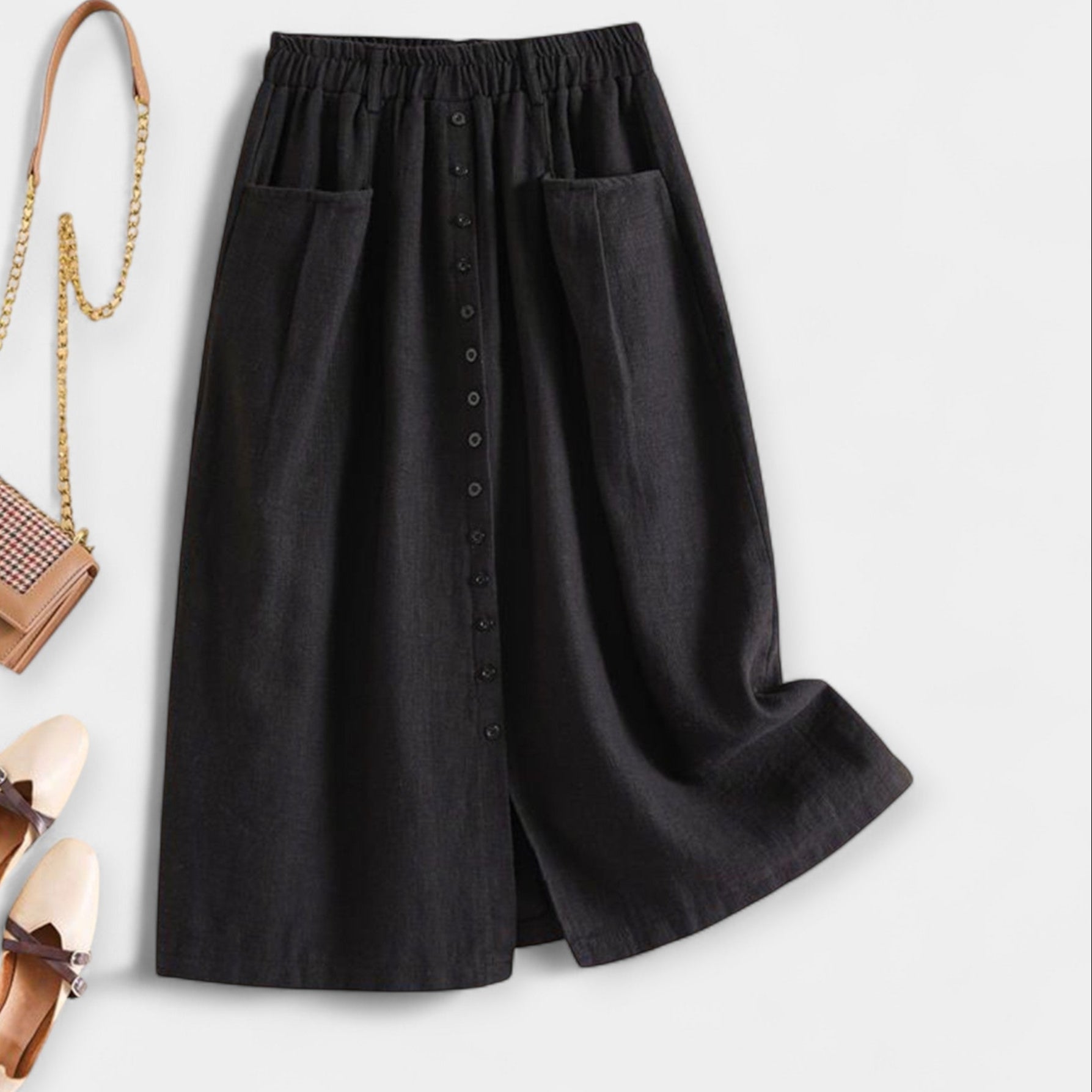 High-waist vintage-style midi skirt in dusty rose with functional front pockets