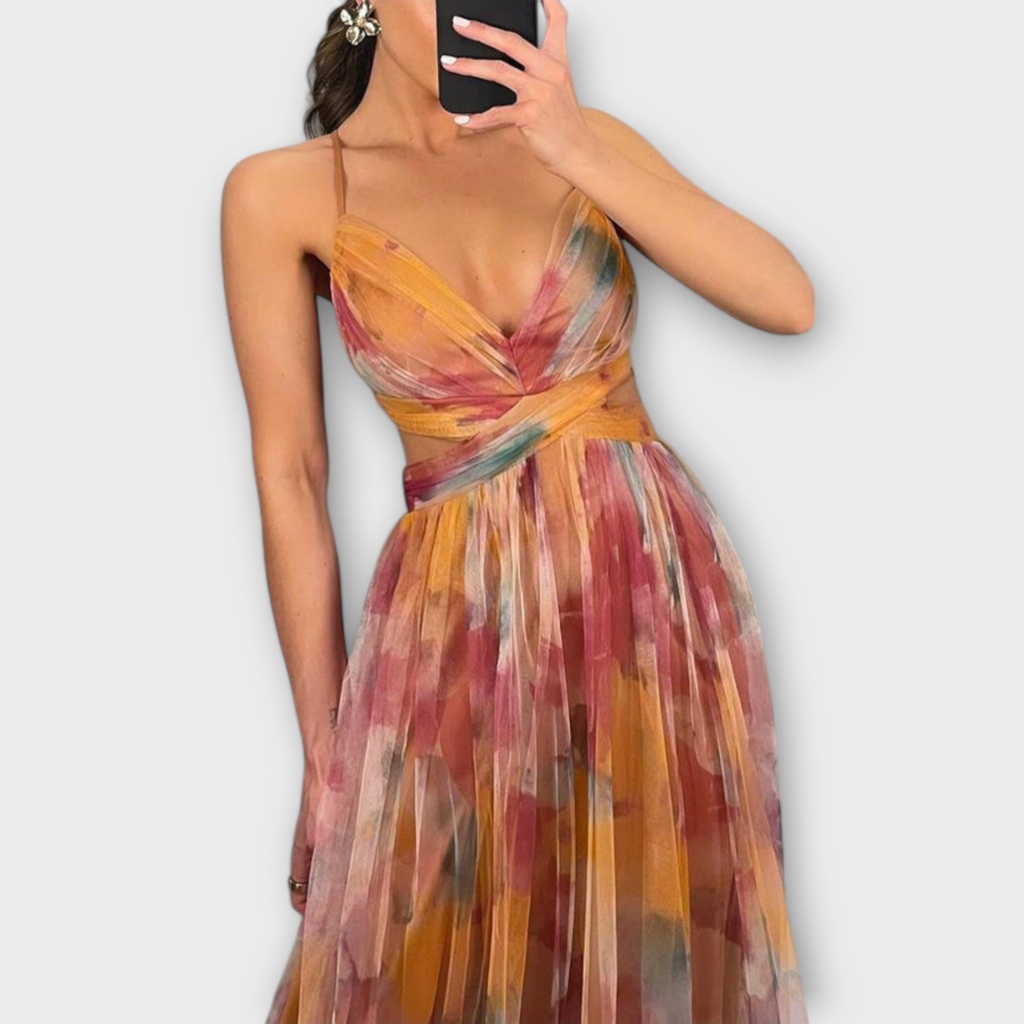 Women's fine-strap maxi dress in orange with a flowing skirt and relaxed summery feel