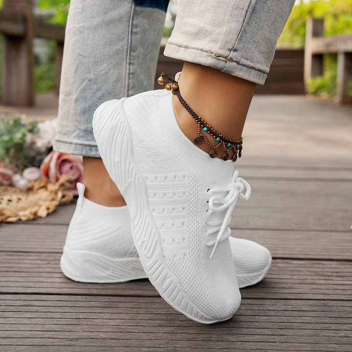 A woman wearing ultra-light comfort trainers on a long walk