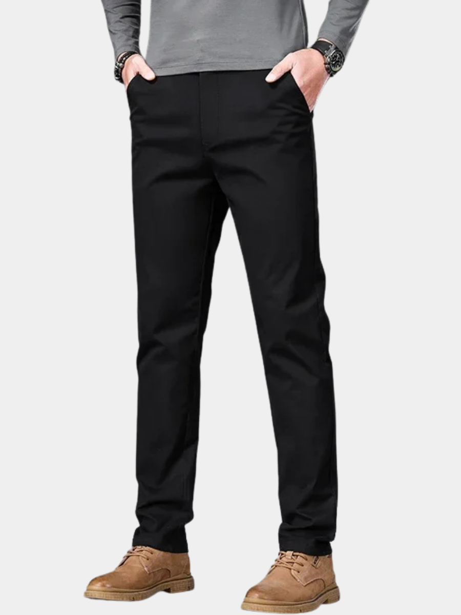 Men's casual trousers in black, blue, dark grey and beige with a relaxed, clean silhouette