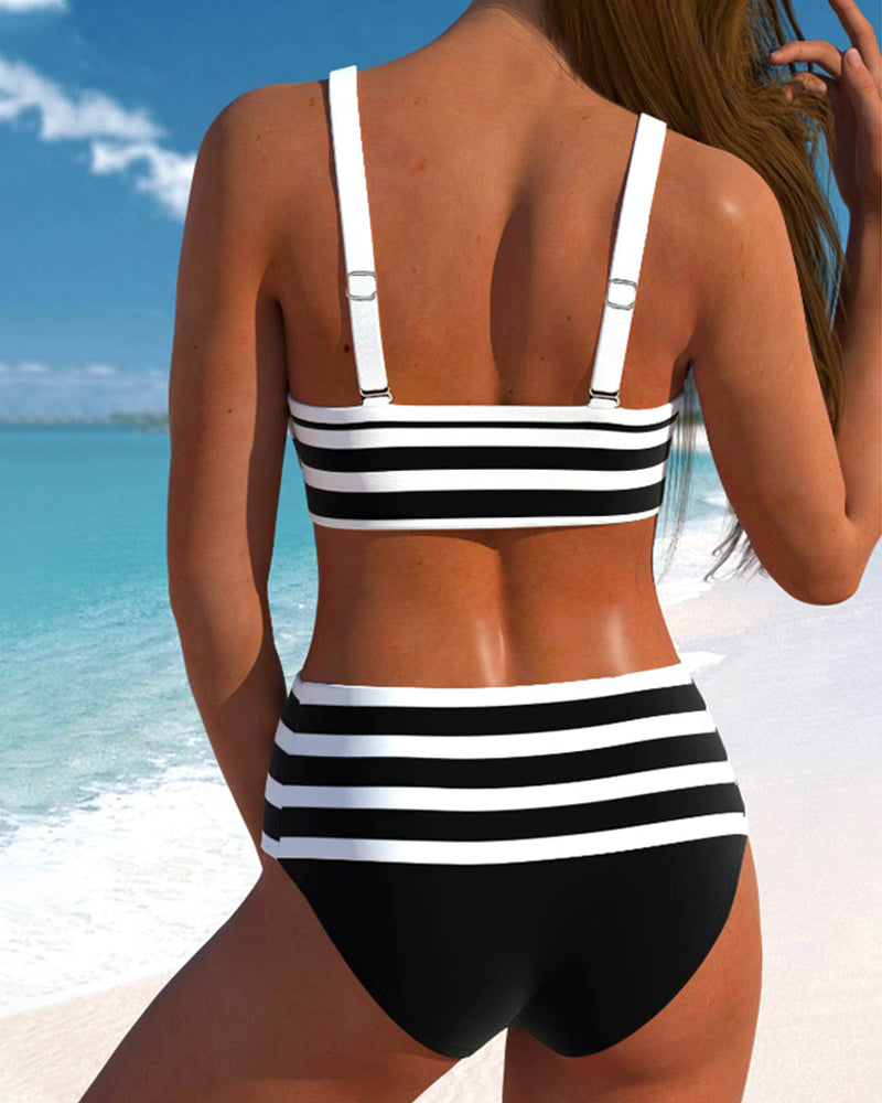Black and white striped high-waist bikini with a knotted front detail on the top
