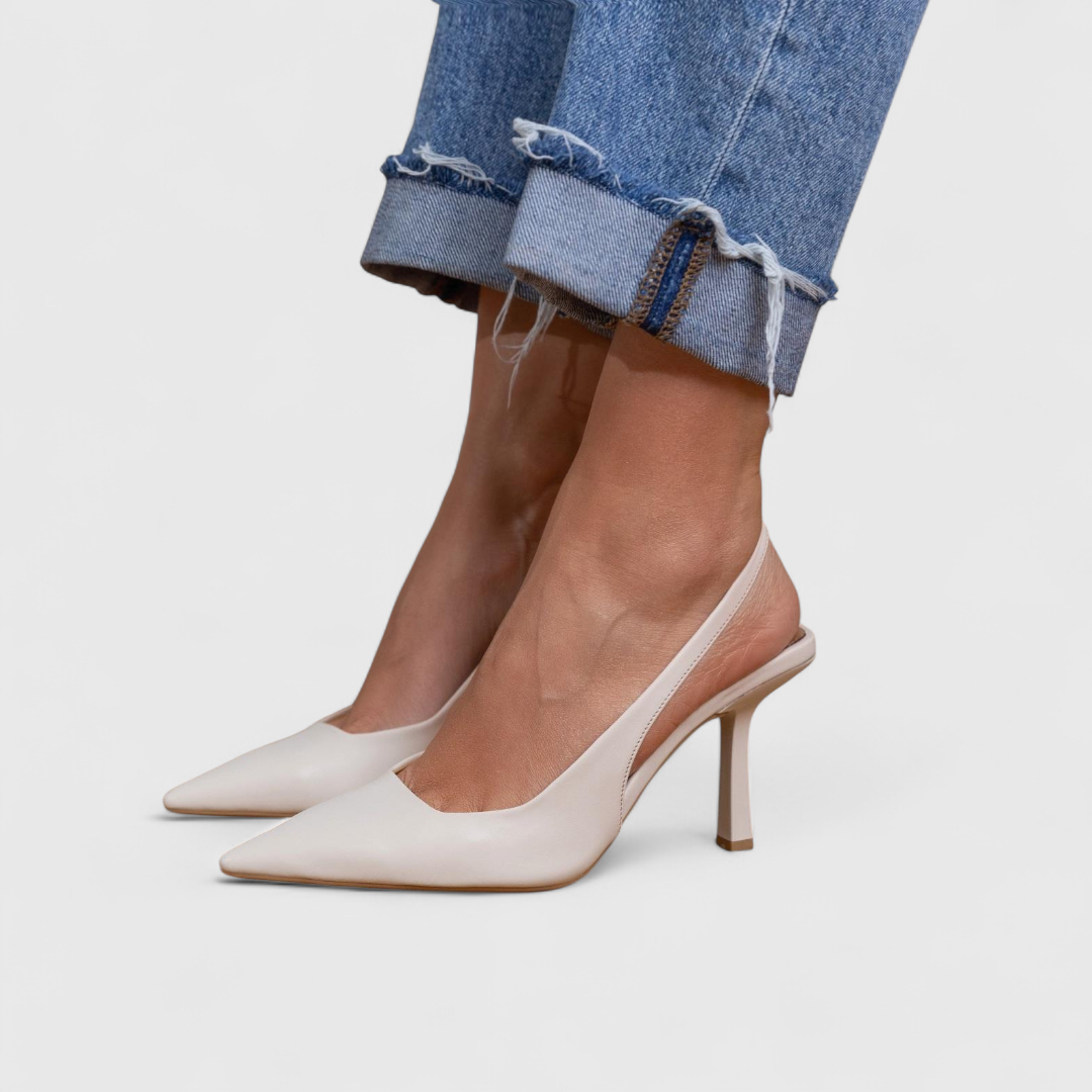 Women's pointy-toe slingback heels in beige with a slender heel and minimalist design