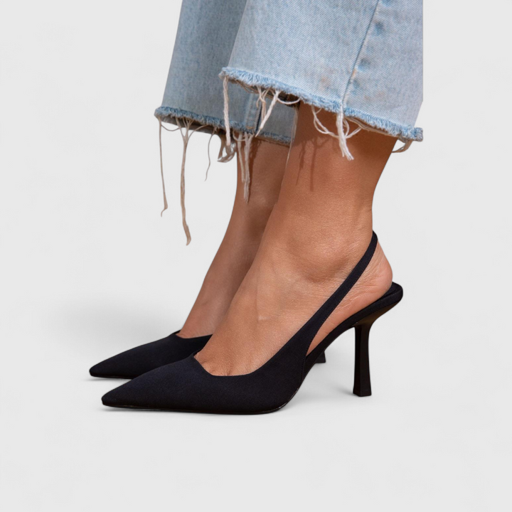 Women's pointy-toe slingback heels in beige with a slender heel and minimalist design