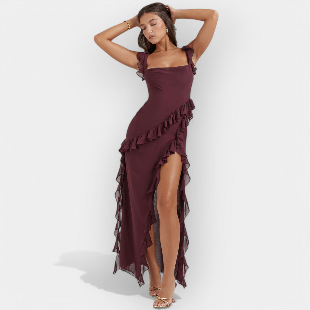 Women's floaty dress in burgundy with a thigh-level slit and delicate ruffle detail