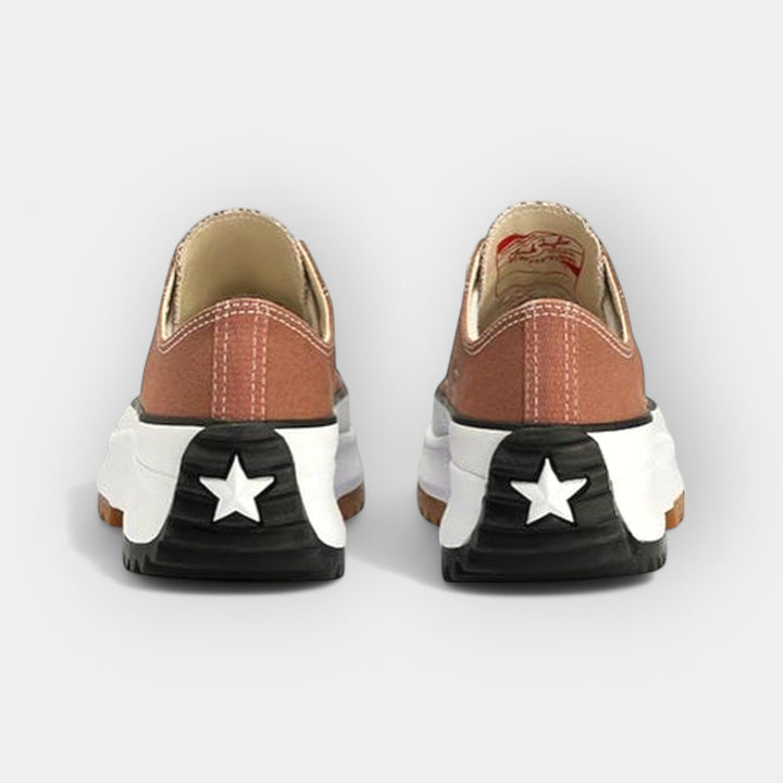 Women's thick-sole comfort trainers in warm brown tones with a chunky ergonomic sole