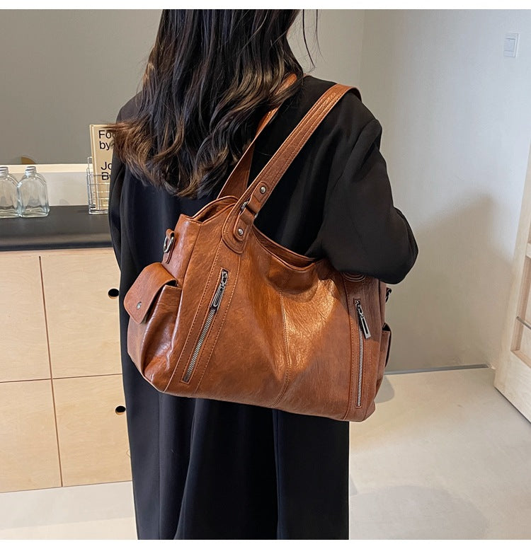 Classic structured tote bag in dark brown with comfortable shoulder straps