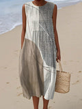 Sleeveless wrap dress with an abstract geometric print and handy side pockets