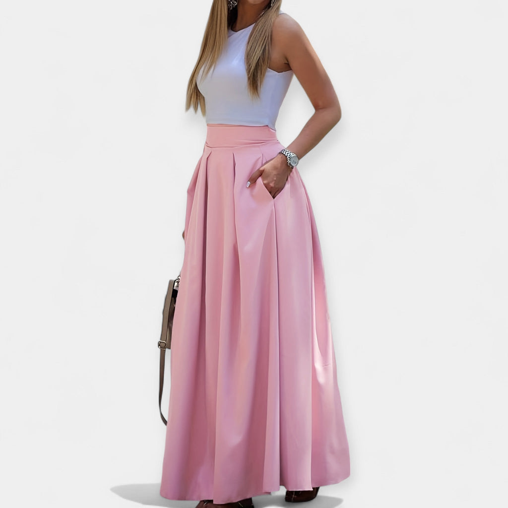 Elegant classic midi skirt in soft pink with a clean feminine silhouette