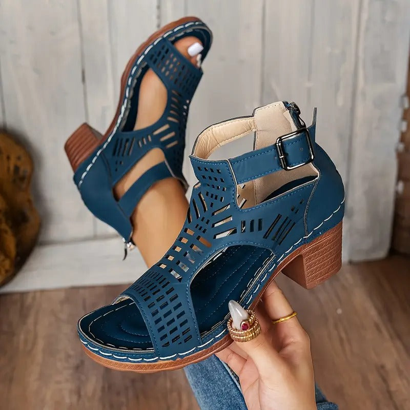 Navy block heel sandals with cutout detail and back fastening