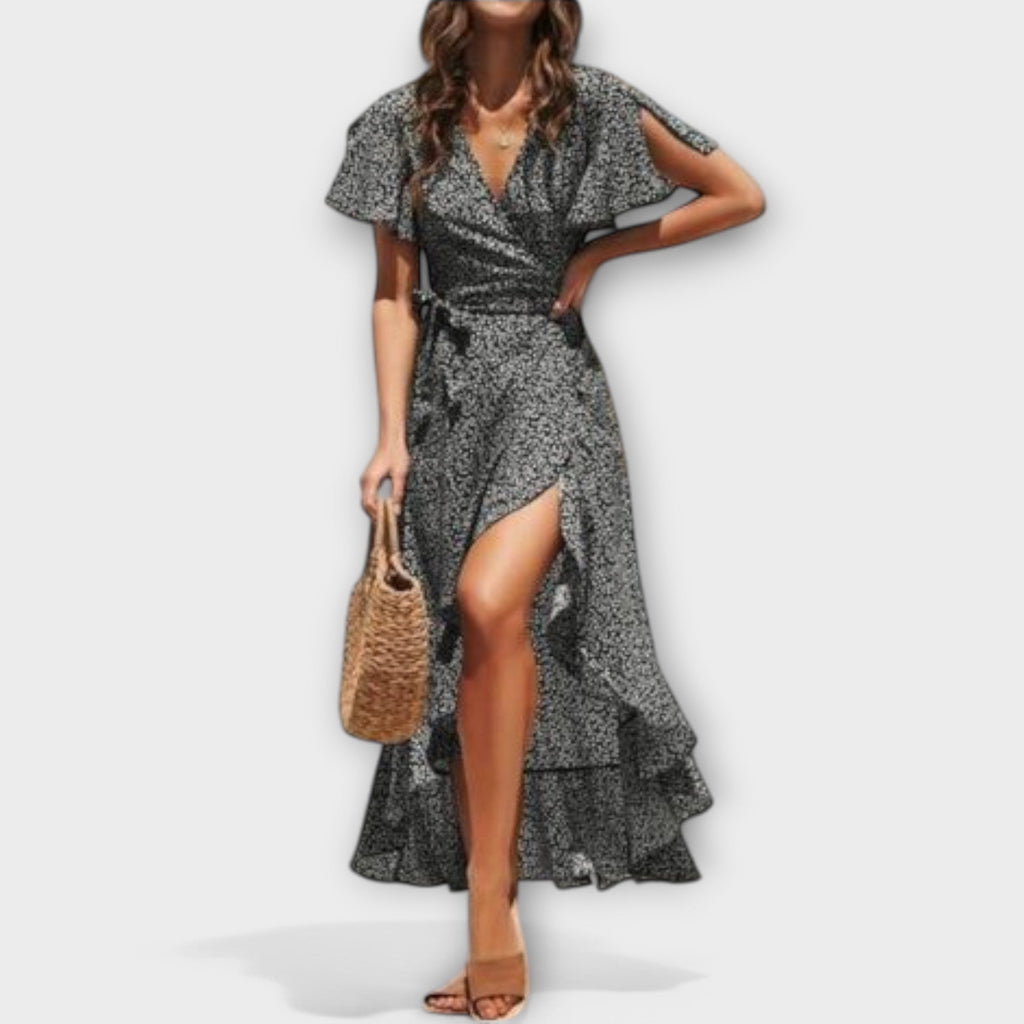Floaty maxi boho dress with a fresh floral print and elegant asymmetric hem in green
