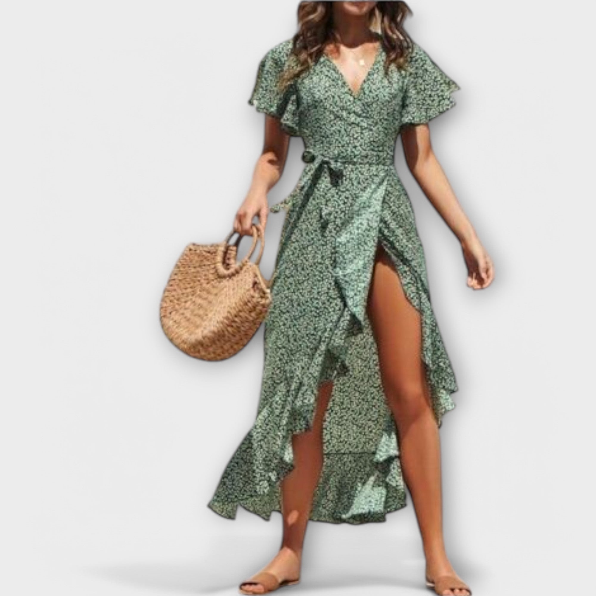 Floaty maxi boho dress with a fresh floral print and elegant asymmetric hem in green