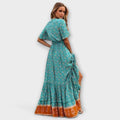 Blue floaty maxi boho dress with a floral print and high-leg split detail