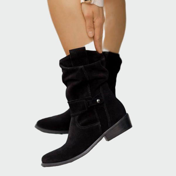 Beige wide-top calf boots with a decorative metal buckle and low heel