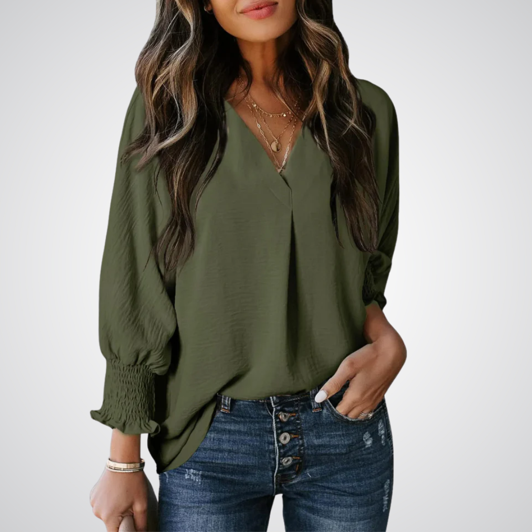 Apricot V-neck tunic blouse with gently ruched flutter sleeves and a flowing relaxed fit