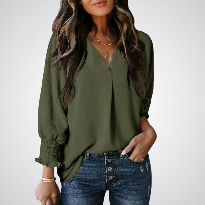 Apricot V-neck tunic blouse with gently ruched flutter sleeves and a flowing relaxed fit