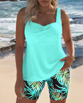 Printed tankini swimsuit in cyan with a colourful patterned bottom