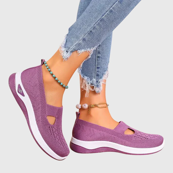 A woman out for a long walk in supportive orthopaedic walking shoes.