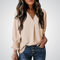 Apricot V-neck tunic blouse with gently ruched flutter sleeves and a flowing relaxed fit