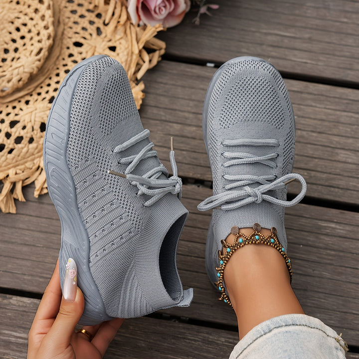 A woman wearing ultra-light comfort trainers on a long walk