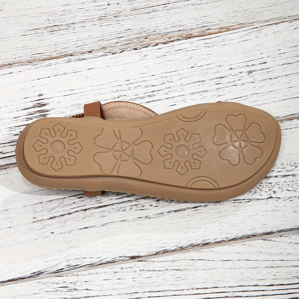 Beaded boho flat sandals in brown with decorative bead detailing and an elastic ankle strap