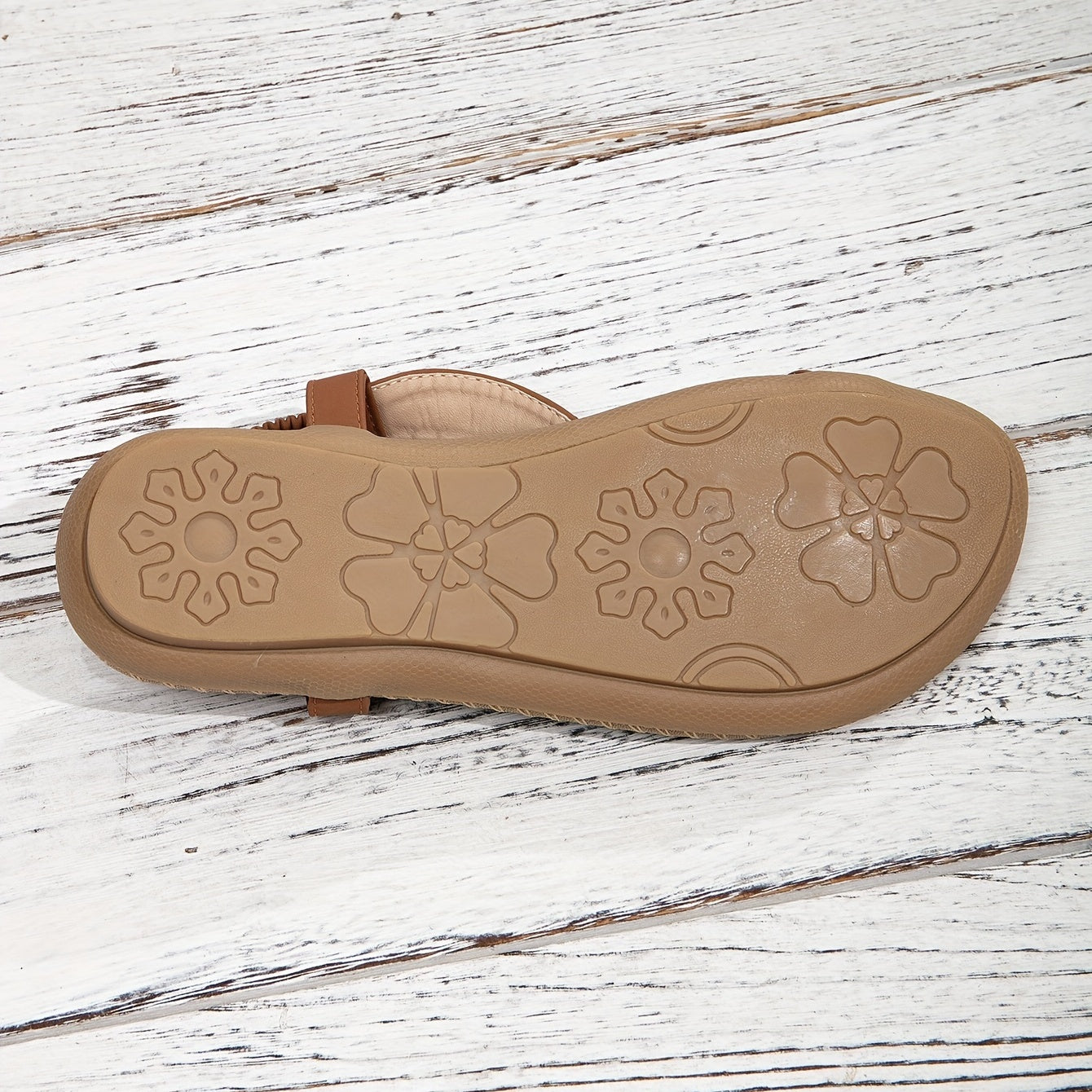 Beaded boho flat sandals in brown with decorative bead detailing and an elastic ankle strap