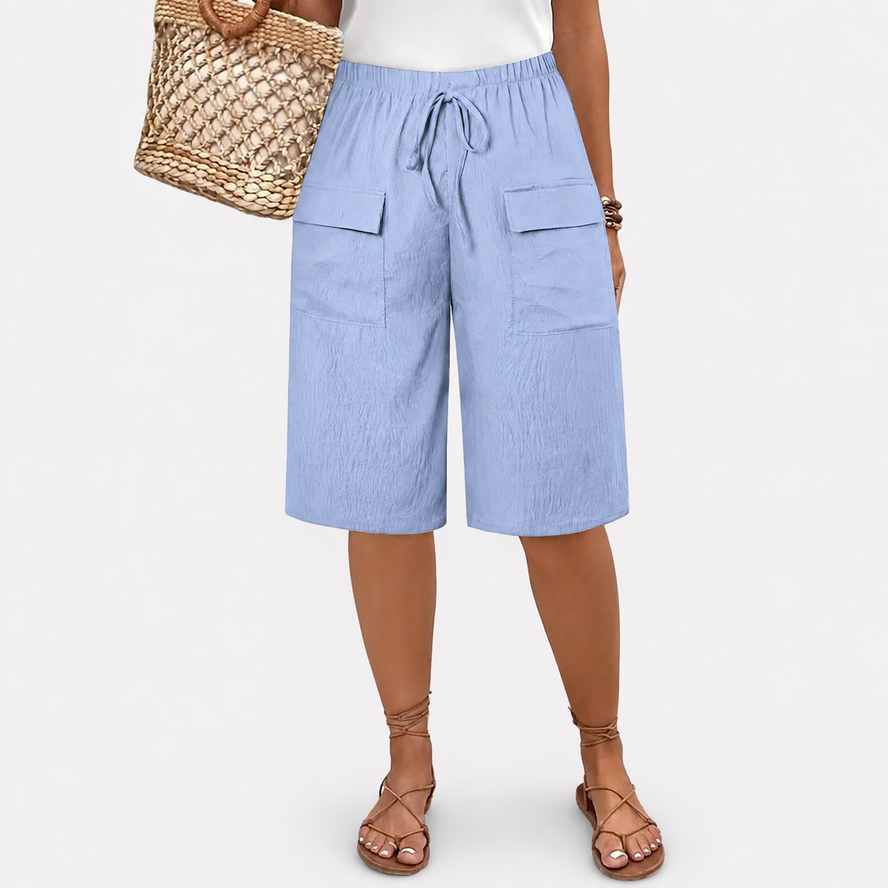 Women's high-waist shorts in terracotta with a relaxed leg and elasticated waistband