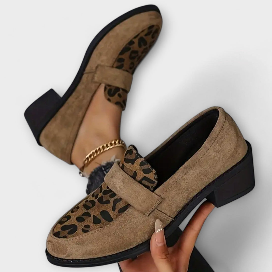 Leopard print loafers in brown tones with a classic, elegant silhouette