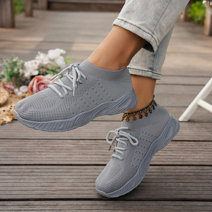A woman wearing ultra-light comfort trainers on a long walk