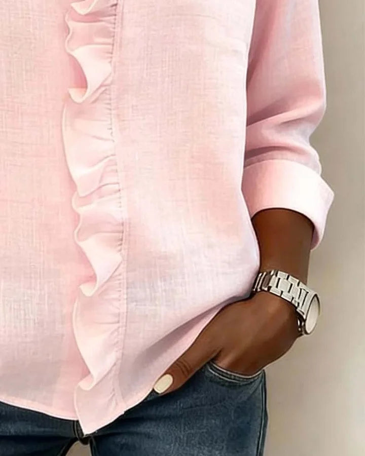 Pink women's V-neck blouse with decorative frill collar and long sleeves