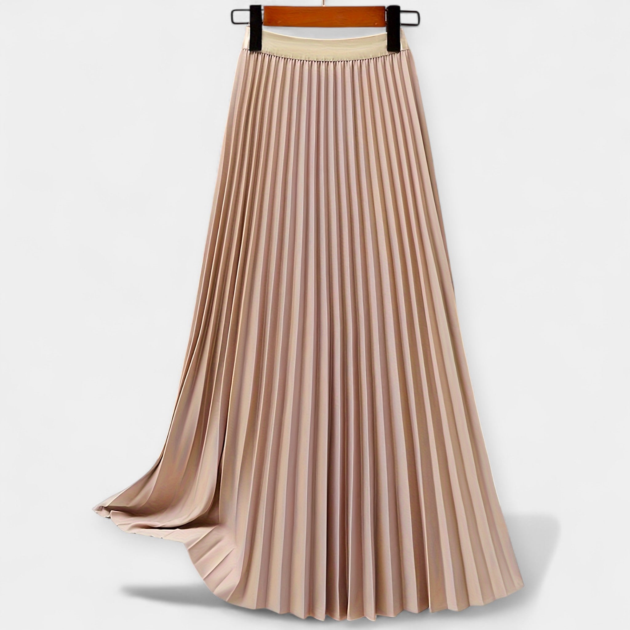 Wide pleated high-waist midi skirt in soft blush pink with a flowing silhouette