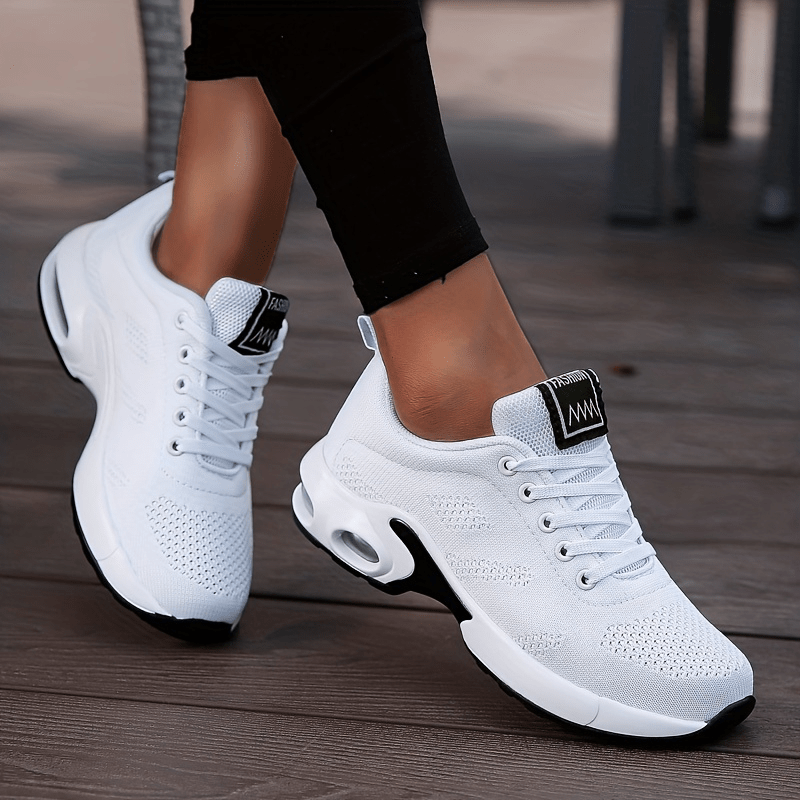 A woman walking further in breathable, air-cushioned non-slip trainers.
