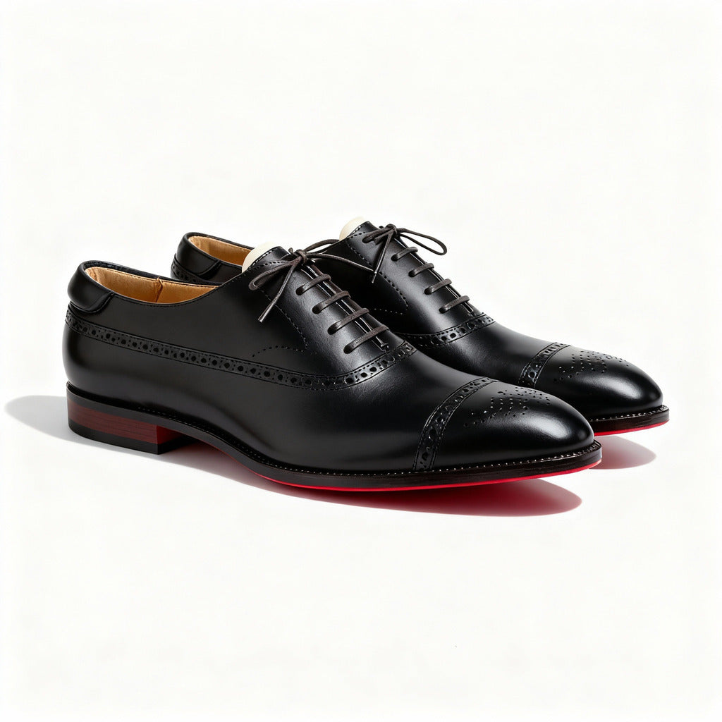 Men's black executive closed-toe shoes with a sharp polished silhouette and contrasting sole