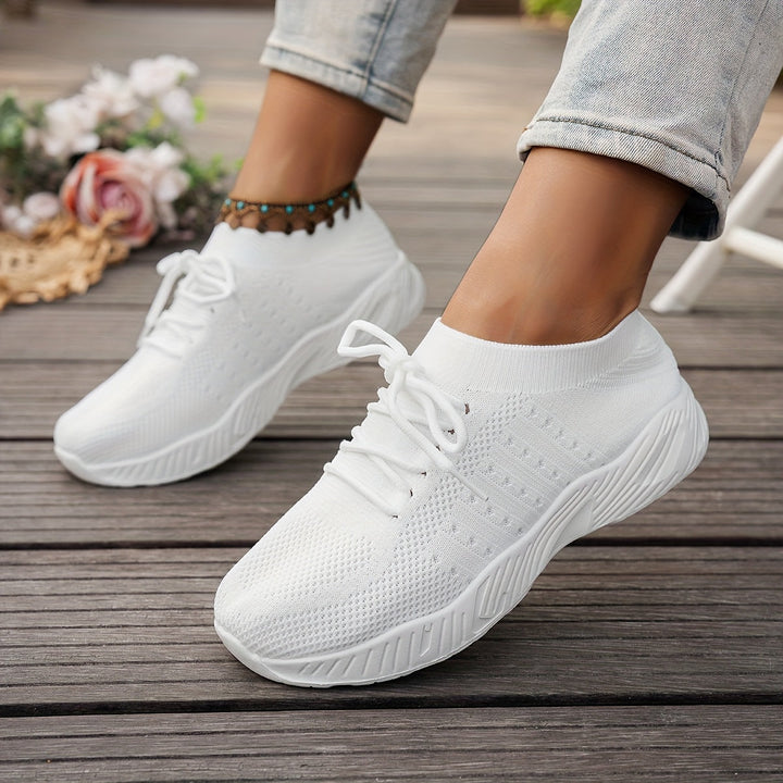 A woman wearing ultra-light comfort trainers on a long walk