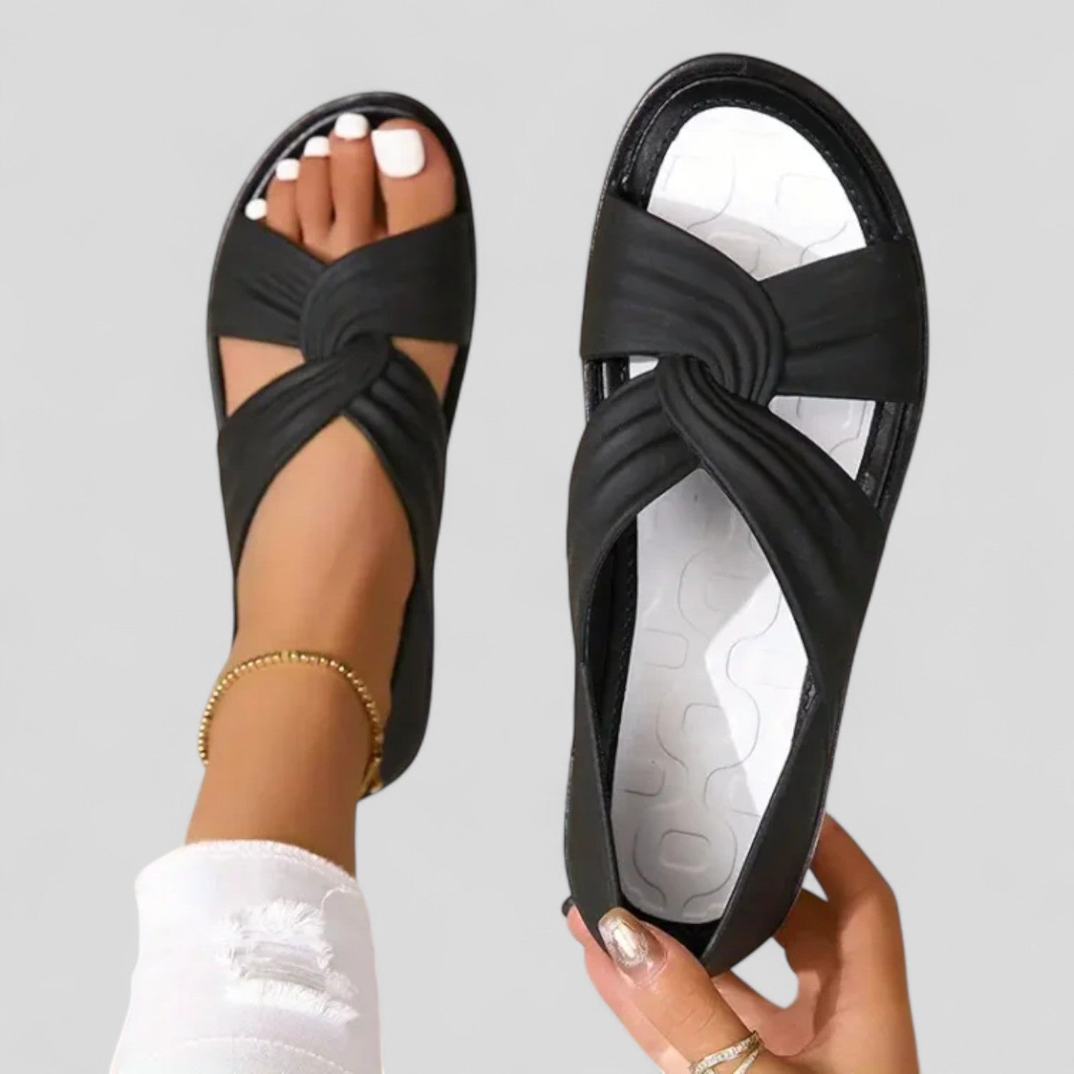 Flat cross-front sandals with a back strap in black, beige and red