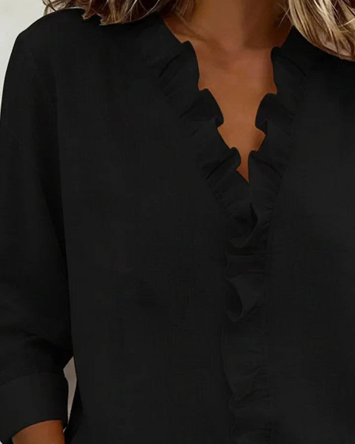 Pink women's V-neck blouse with decorative frill collar and long sleeves