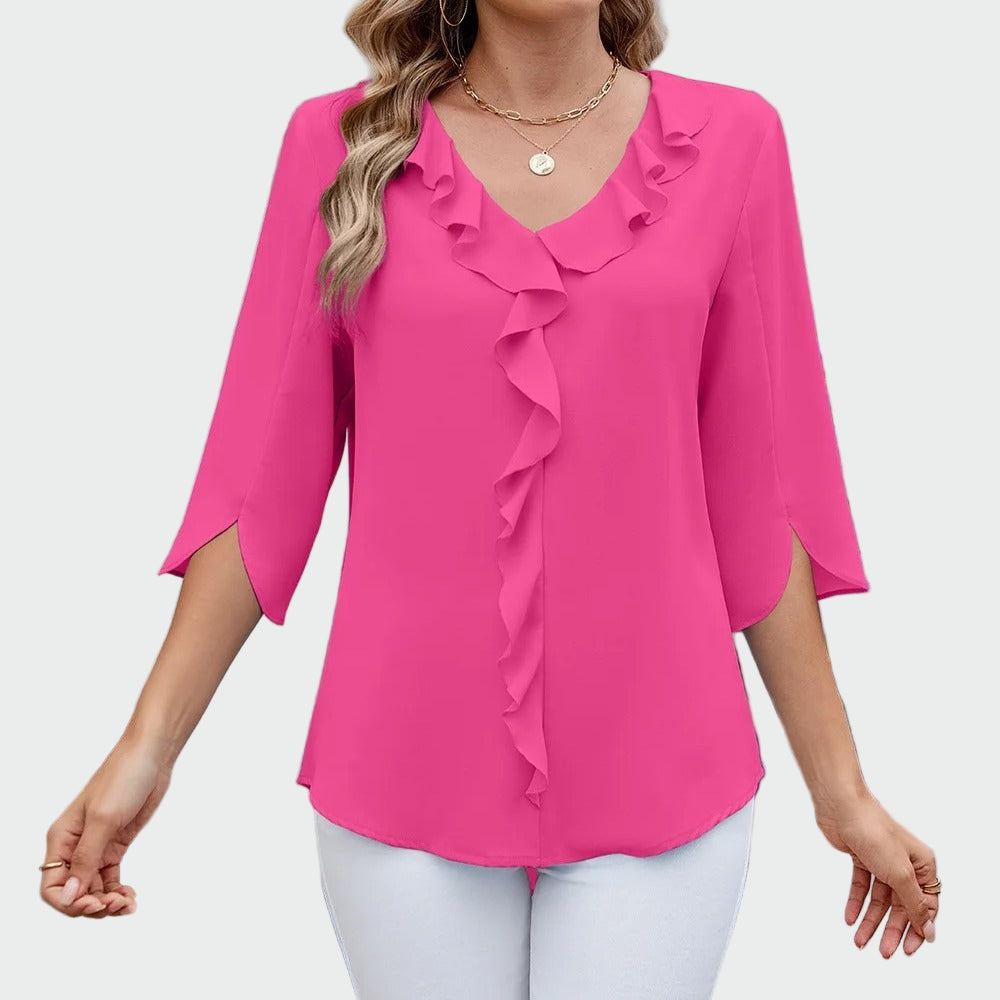 Elegant blouse with romantic ruffles at the V-neckline and three-quarter sleeves with a side split, shown in black