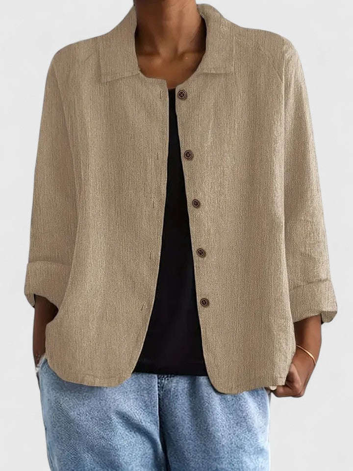 Women's lightweight button jacket in soft dusty blue with a relaxed, open silhouette