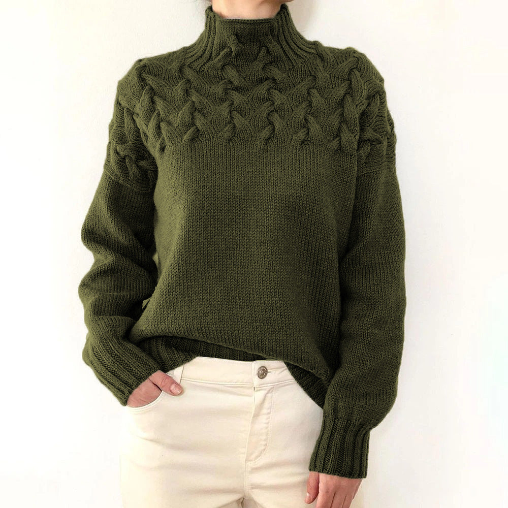 A woman wearing a warm roll-neck jumper, cosy and elegant on a cold winter day.