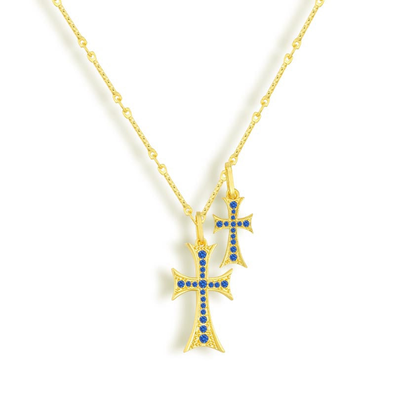 Double strand necklace with blue stone accents in a gold tone finish