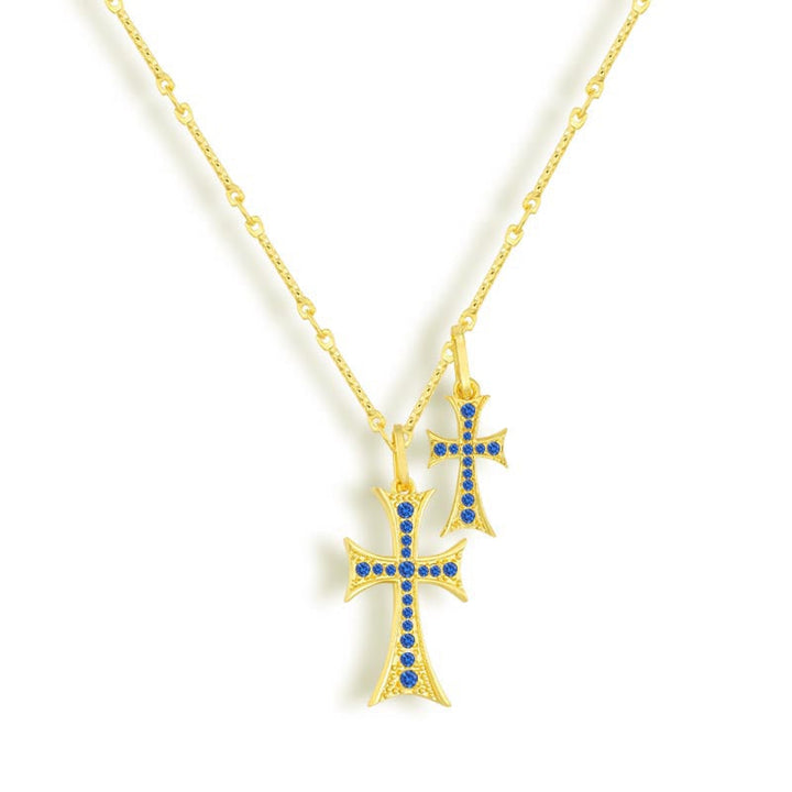 Double strand necklace with blue stone accents in a gold tone finish