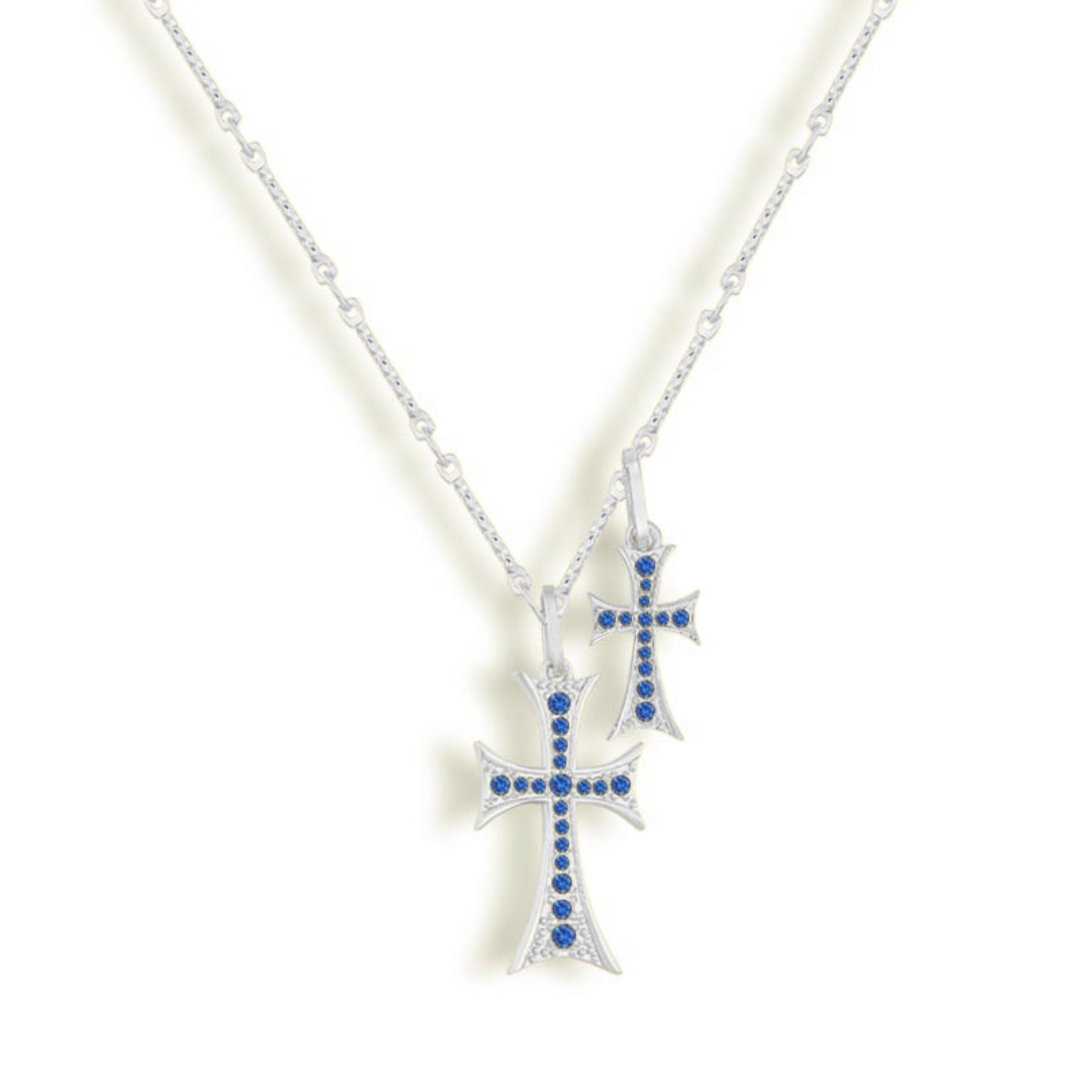 Double strand necklace with blue stone accents in a gold tone finish