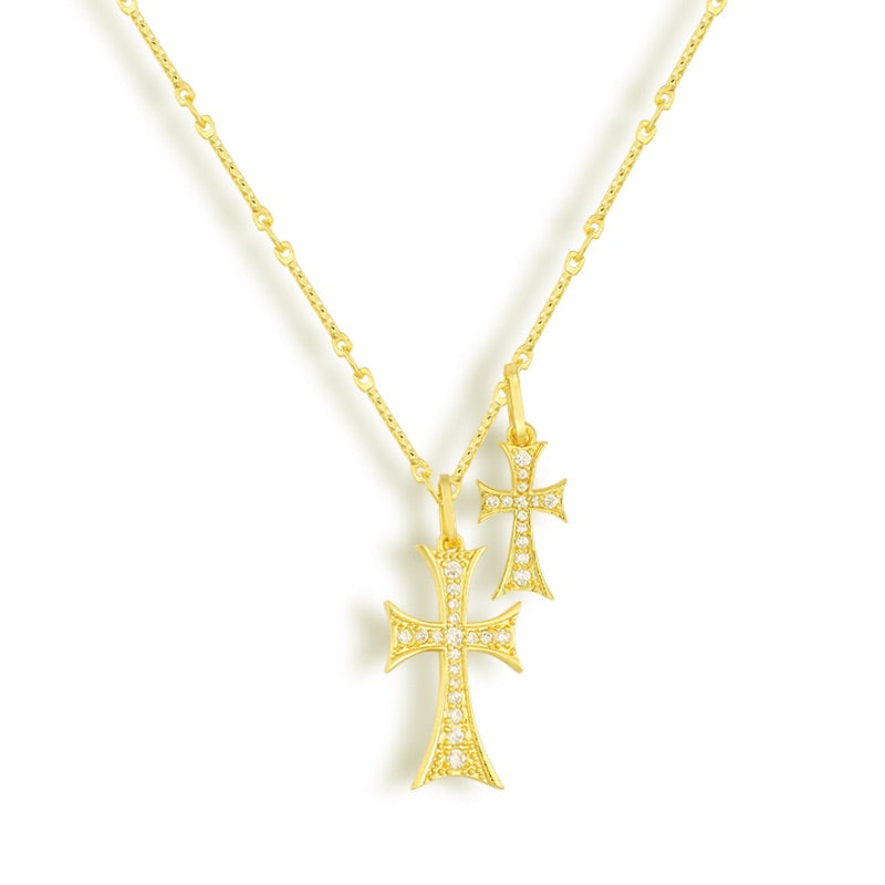 Double strand necklace with blue stone accents in a gold tone finish