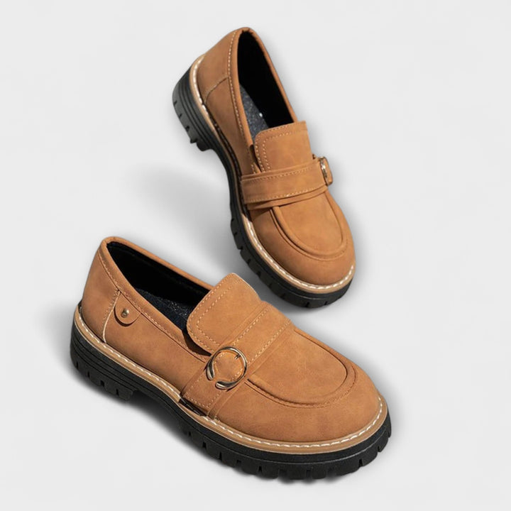A woman wearing soft round-toe loafers with a casual everyday outfit