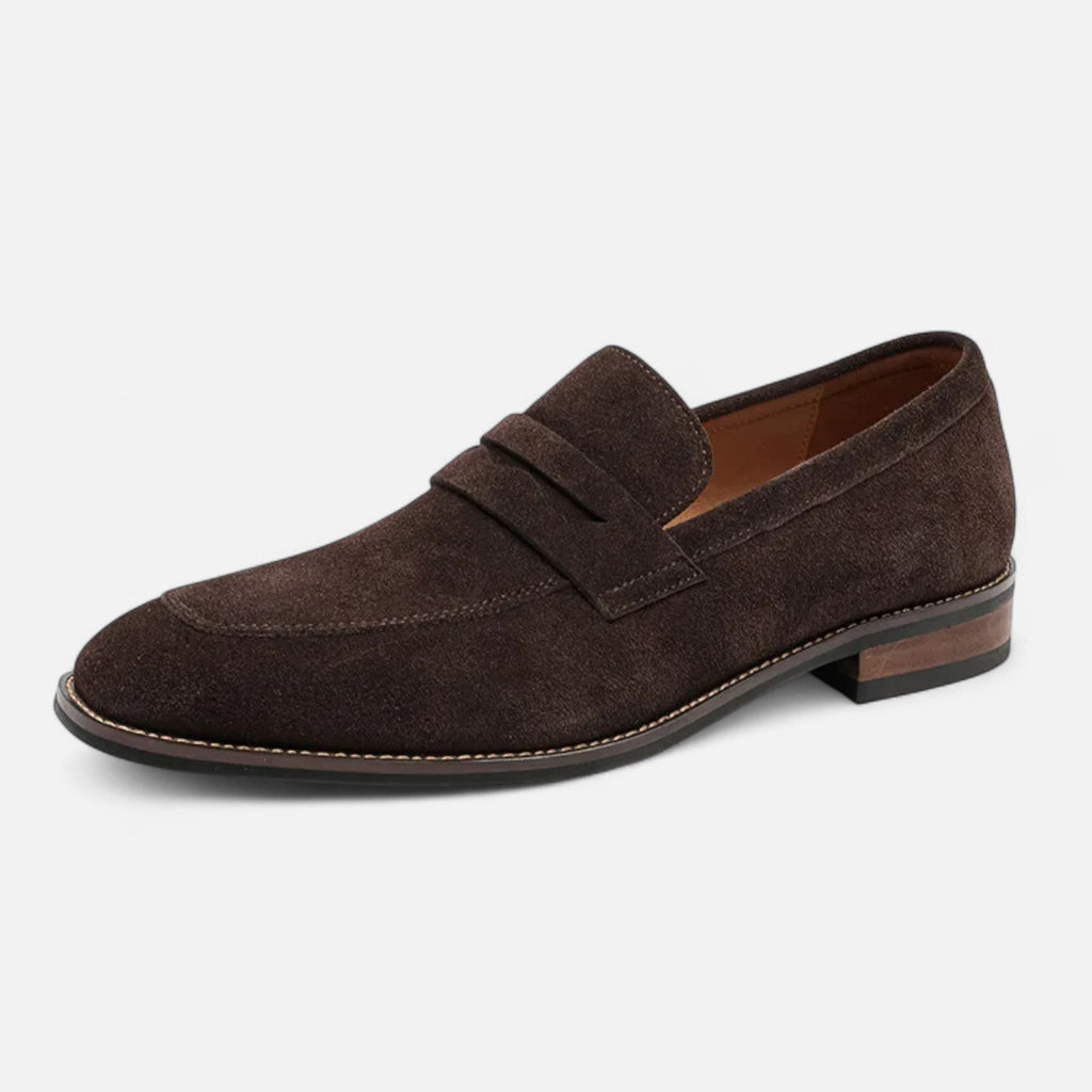 Men's tan coffee penny loafers with a clean structured upper and classic loafer silhouette