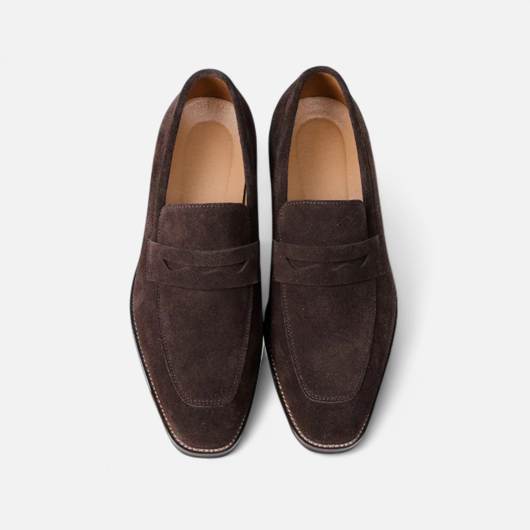 Men's tan coffee penny loafers with a clean structured upper and classic loafer silhouette