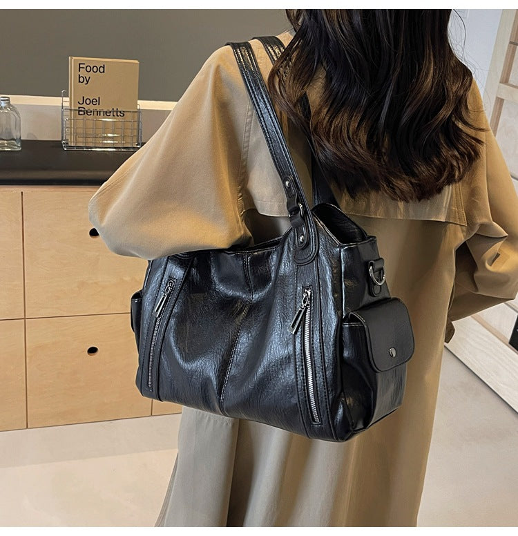Classic structured tote bag in dark brown with comfortable shoulder straps