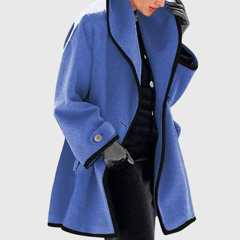 A woman wearing a double-breasted buttoned jacket on a cold day