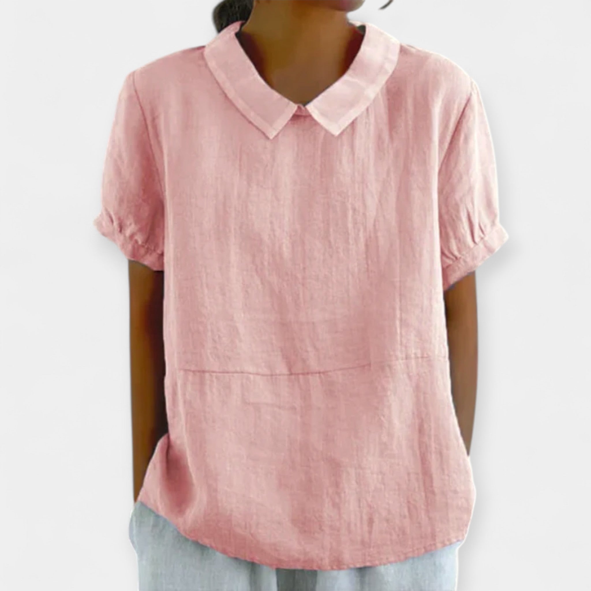 Pale blue collarless everyday blouse with a refined neckline and relaxed comfortable fit