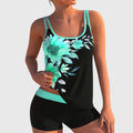 Floral print tankini with a dark base in blue, yellow and turquoise colourways